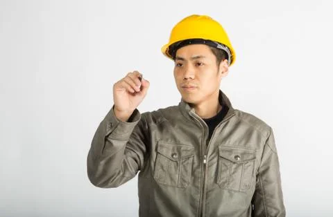 Construction worker writing notes Stock Photos