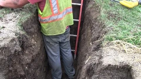 Construction Worker in a Yellow florescent vest Stock-Footage 79176426