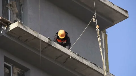 Construction worker in a yellow hard hat Video stock 62546696