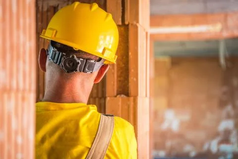 Construction Worker in Yellow Hard Hat Photos