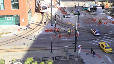 Construction workers and lightrail city time lapse Stock Footage 37621558