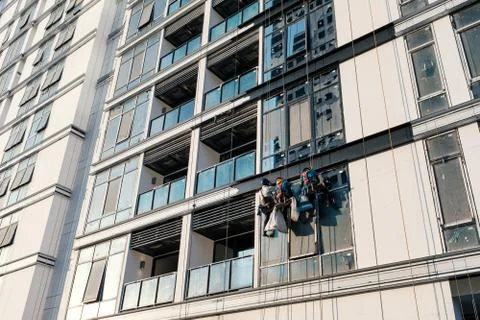 Construction workers and scaffold system Stock Photos