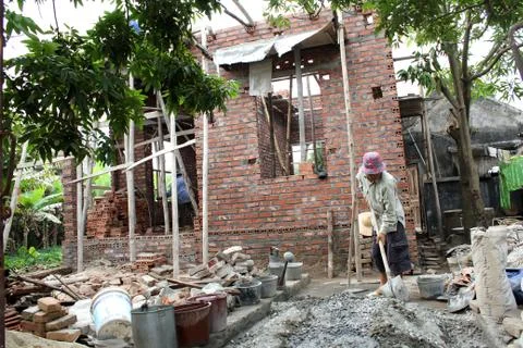 Construction workers are building house Stock Photos
