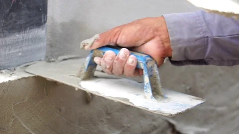 Construction workers are operating side by side with cement construction site  Stock Footage 112946826