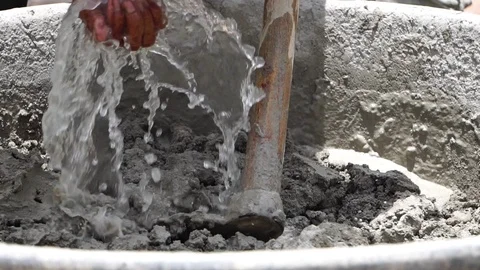 Construction workers are operating side by side with cement construction site  Stock Footage 112947982