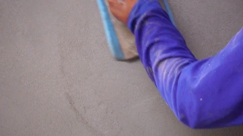 Construction workers are operating side by side with cement construction site  Stock Footage 112949980
