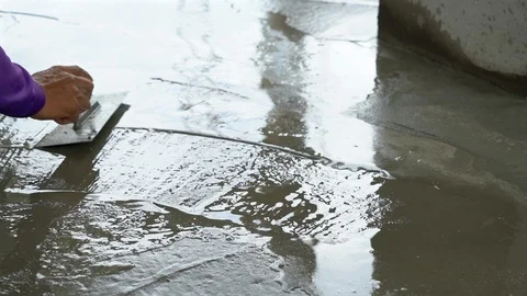 Construction workers are polishing concrete surface. Stock Footage 98070403
