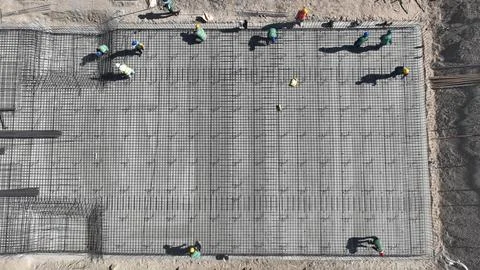 Construction workers are speeding up work at the 300MW/1200MWh grid-side inde Stock Photos