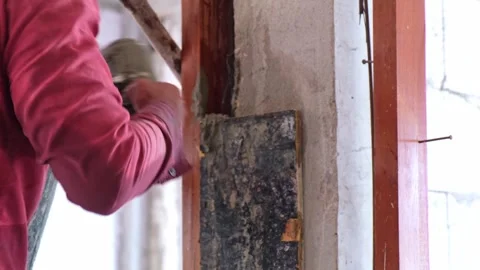 Construction workers are using containers to pour mixed cement into buildin.. Stock Footage 300075185
