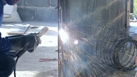 Construction workers are welding steel in building construction work Stock Footage 144546487