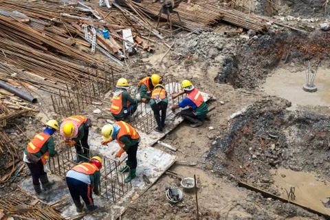 Construction workers are working in the condominium construction area Stock Photos