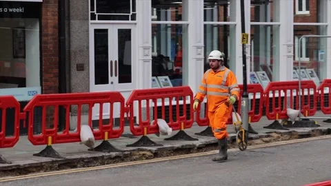 Construction workers on Bedford high street Stock Footage 148174587