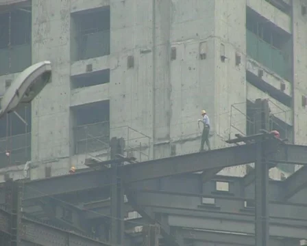 Construction workers in Beijing. Dangerous Walk. Stock Footage 285287