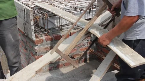 Construction workers build a building in construction Stock Footage 49699471