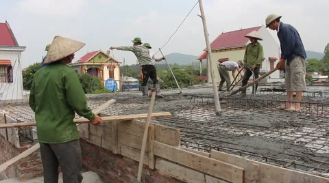 Construction workers build a building in construction Stock Footage 49699811