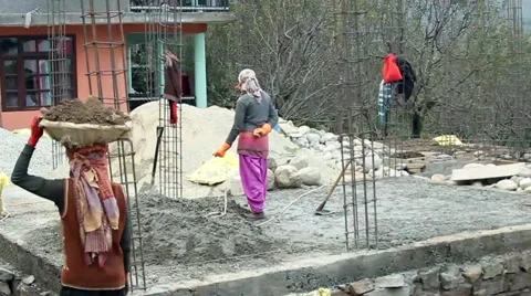Construction workers build a house in a Himalayan village slow motion Stock Footage 58161612