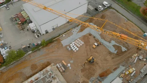Construction workers build a house shooting from the air Stock Footage 121726489