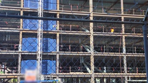 Construction workers building a condominium Video stock 317875841