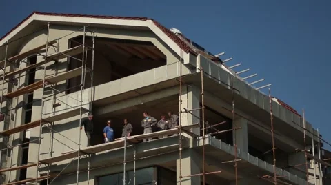 Construction Workers Building Contemporary House Company Scaffolding Video stock 68419428