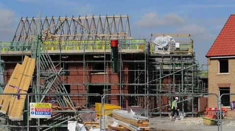Construction workers building new houses united kingdom Stock Footage 66533892