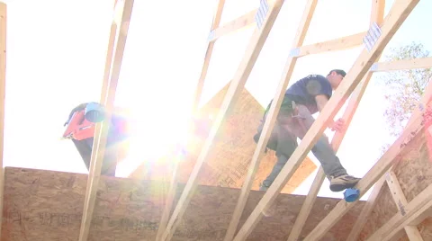 Construction workers building roof Stock Footage 57714930