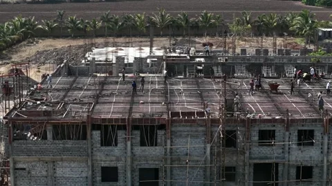 Construction Workers on Building Site Casting Concrete Slab with Iron Rods and Stock Footage 344091797