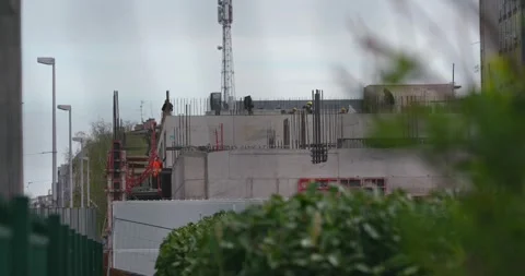 Construction workers on building site 库存影片 332512658