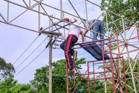 Construction workers building with steel structure. Stock Photos