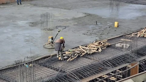 Construction workers building underground parking in Bole, Addis Ababa, daytime. Stock Footage 302281317