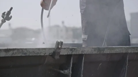 Construction workers cleaning steel concrete molds Stock Footage 109448772