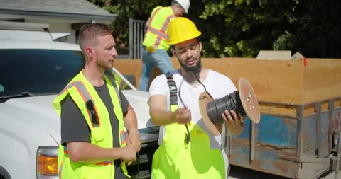 Construction Workers Collaborating Effectively on a Remodeling Project Together Stock Footage 287981915