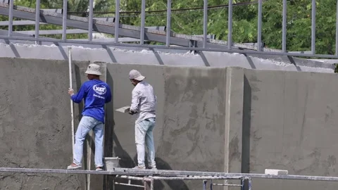 Construction Workers Collaborating on Site Video stock 308616046