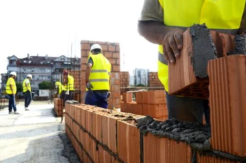 Construction workers at construction site Stock Photos