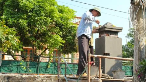 Construction workers construction workers plasterings house Foto stock