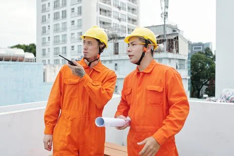 Construction Workers Discussing Problem Stock Photos