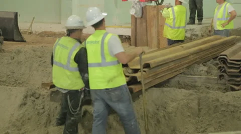 Construction Workers Discussing Work On Construction Site Stock Footage 46595011