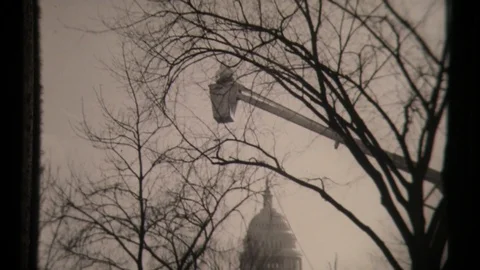 Construction Workers in Electric Crane Close to Electrical Poles and Electricity Stock Footage 129863825