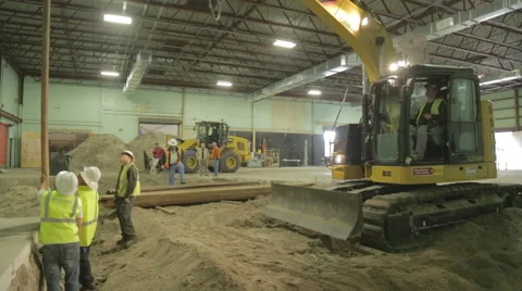 Construction Workers Guiding Steel Beam On Construction Site Stock Footage 46594304