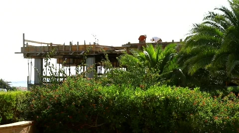 Construction Workers Hammering and Talking Stock Footage 774743