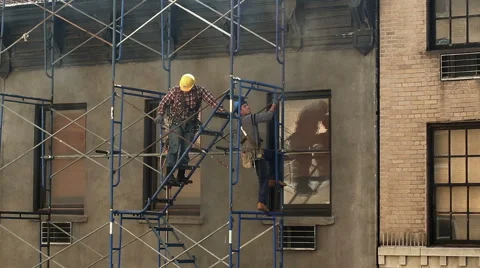 Construction Workers Hardhats Scaffolding Building NYC Union Video stock 42565001