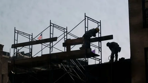 Construction Workers Hardhats Scaffolding Building NYC Union American Flag Stock Footage 42571046