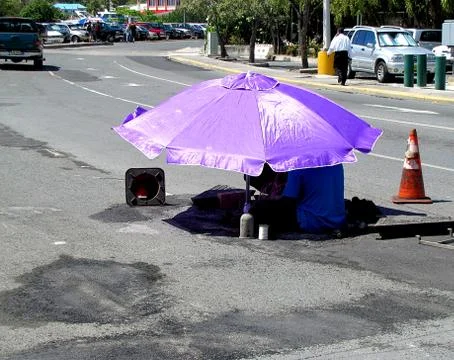Construction workers hiding from the sun in the Caribbeans-Stock photos Stock Photos
