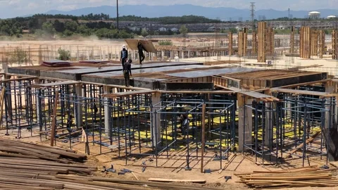 Construction Workers Installing Formwork On Vast Two Storey Terrace House Site Stock Footage 344557383