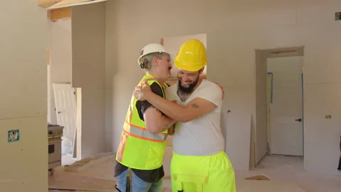 Construction Workers Joyfully Celebrating Their Friendship While Working on the Vídeo Stock 307835154