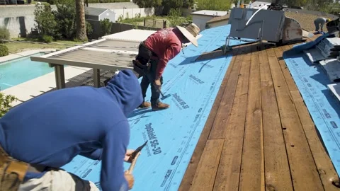 Construction Workers Laying Roof Insulation Sheet Stock Footage 329402301