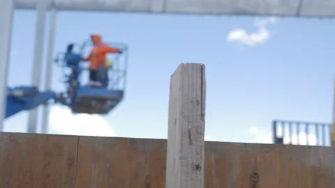 Construction Workers On Lift - Bokeh Stock Footage 133004017