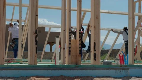 Construction Workers Lift Framed Wall Into Place Video stock 80833837