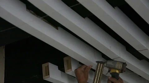 Construction workers make the ceiling whiite lath in construction interior site Stock Footage 83780301