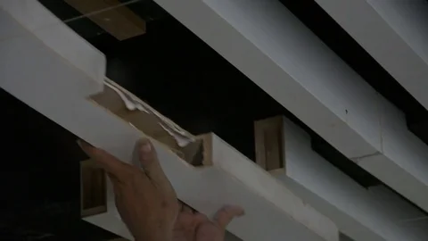 Construction workers make the ceiling whiite lath in construction interior site Stock Footage 83780512