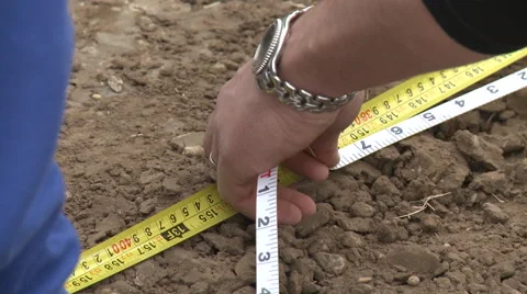 Construction workers marking measurement Stock Footage 57713842